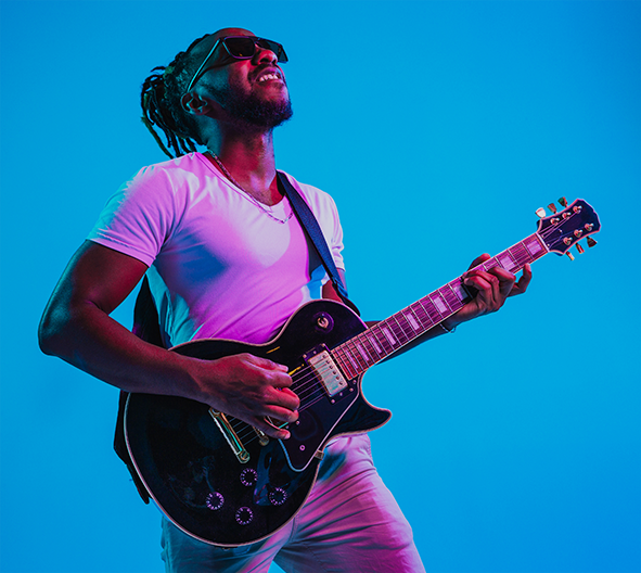 Hands adjusting audio mixer in music production